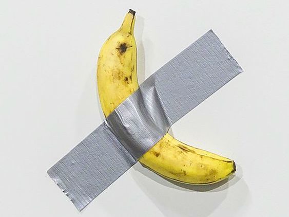 an art piece with a banana that is taped to a wall. for this food entry. caribu mommy mom mother's blog that gives parenting advice for kids, children, toddlers, preschoolers.