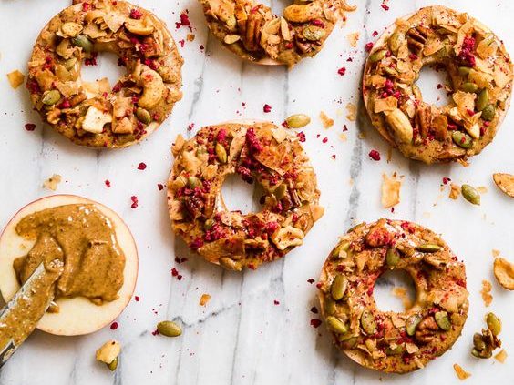 fake donuts with apple sliced and toppings used for this food entry. caribu mommy mom mother's blog that gives parenting advice for kids, children, toddlers, preschoolers.